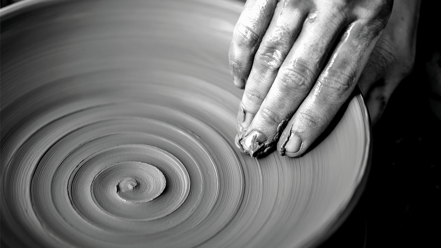 hands with clay