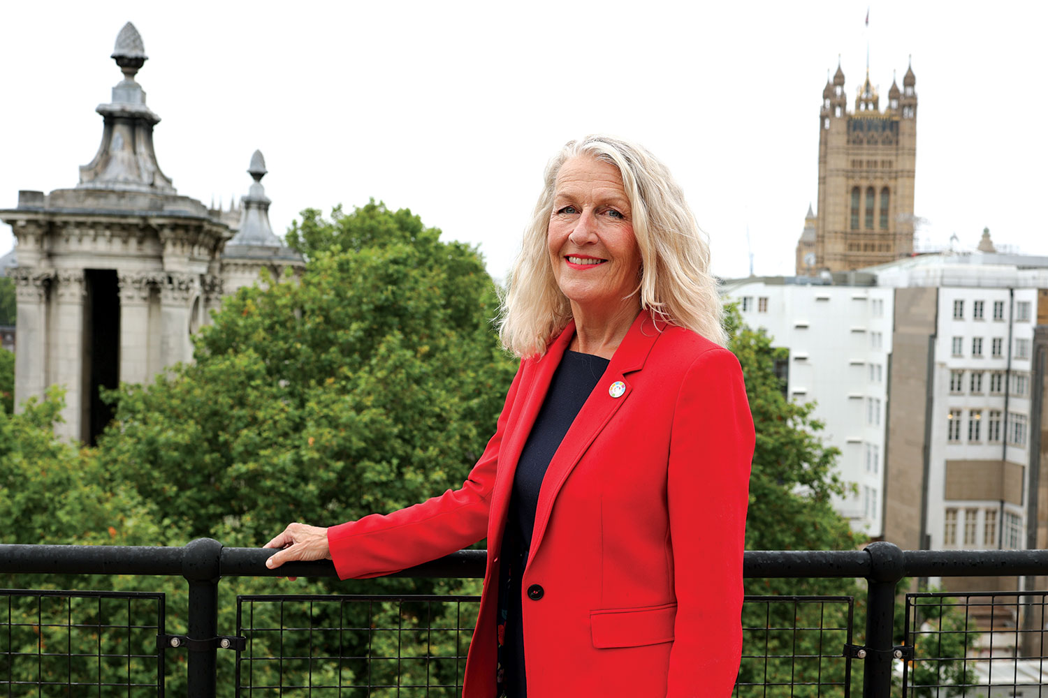 Cllr Louise Gittins standing in a balcony