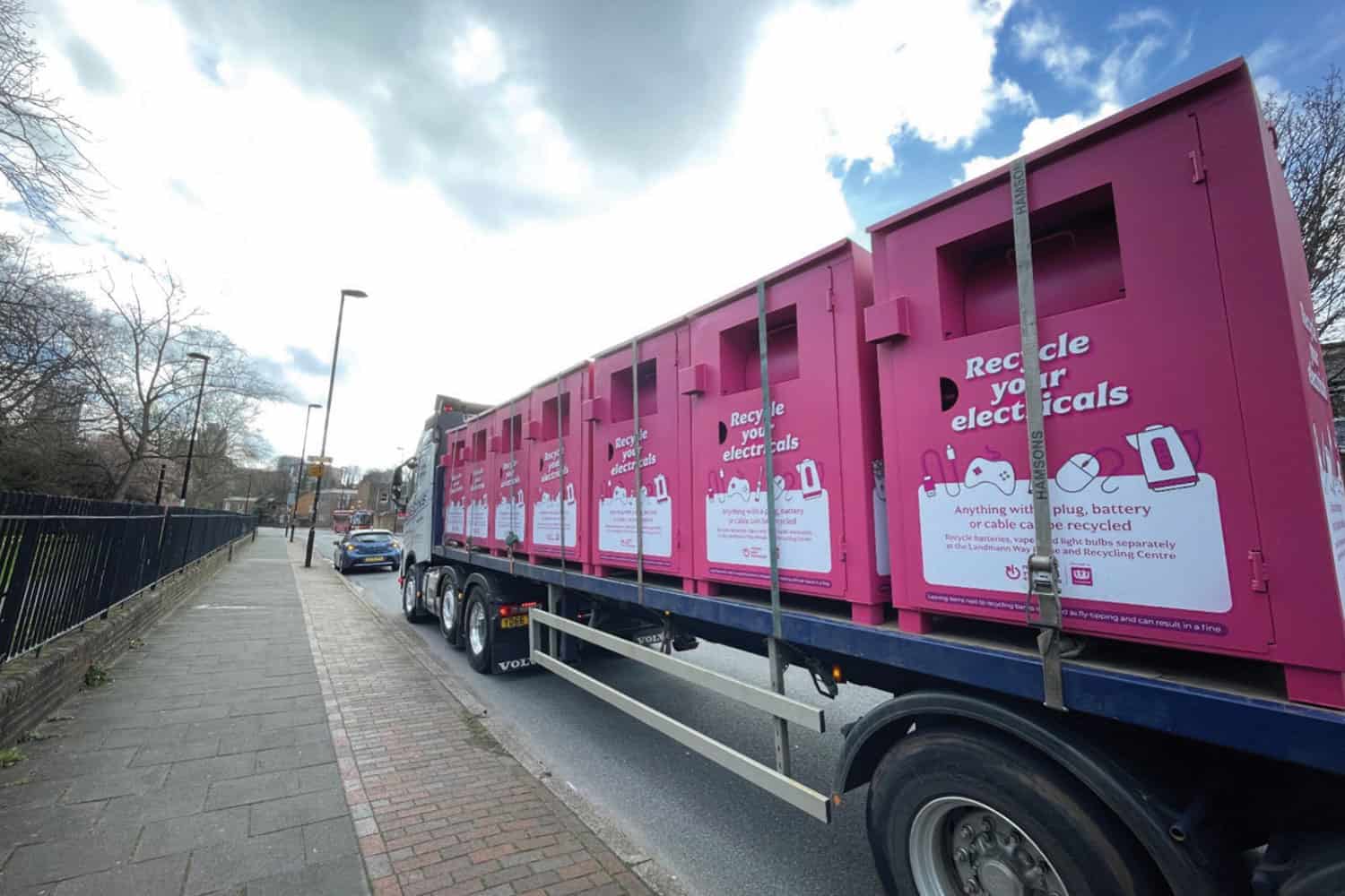 photo of pink e-recycling containers on the back of a lorry, copyright Lewisham Council