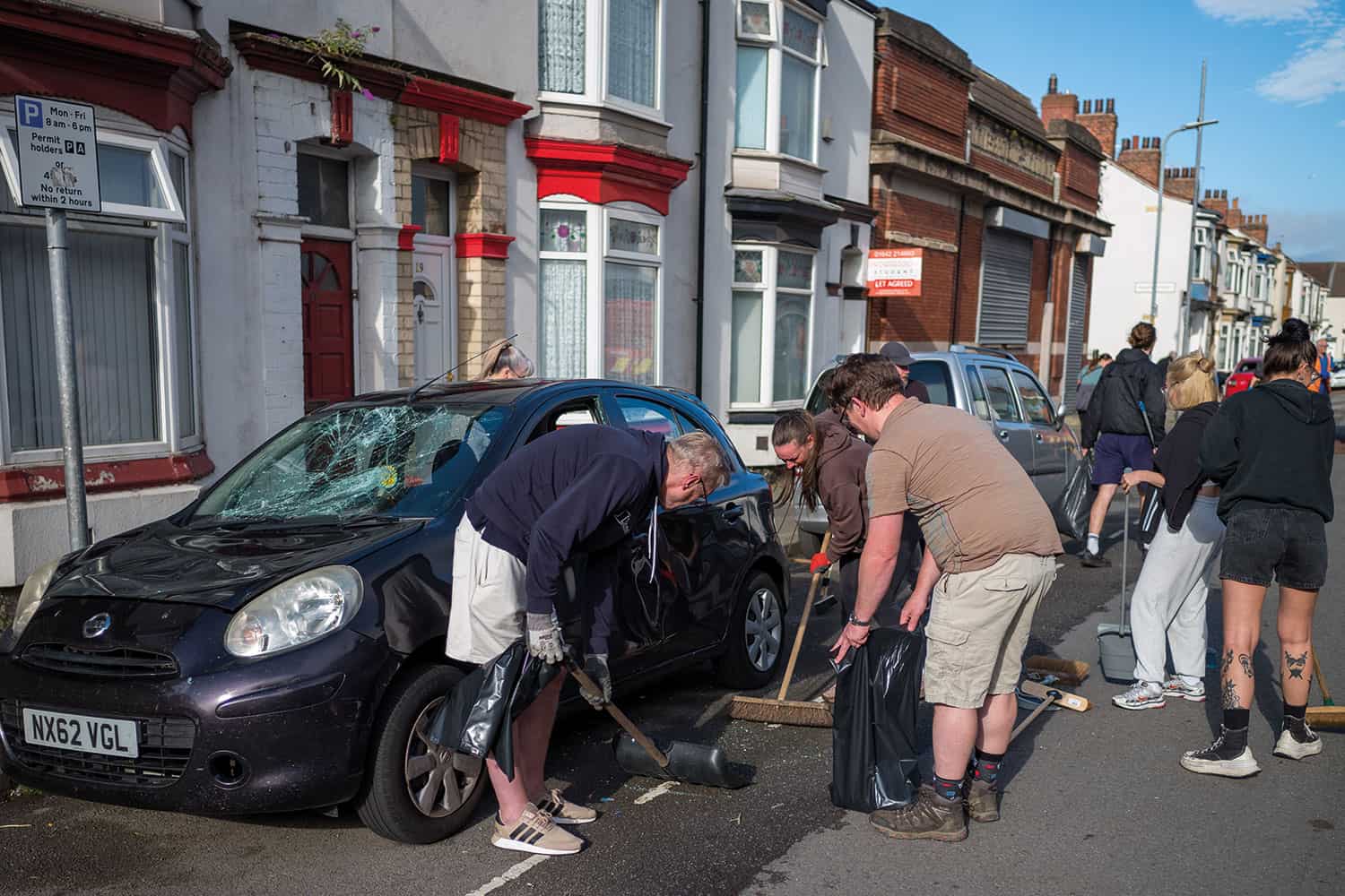 photo of members of the Middlesbrough community coming together to clean up their streets