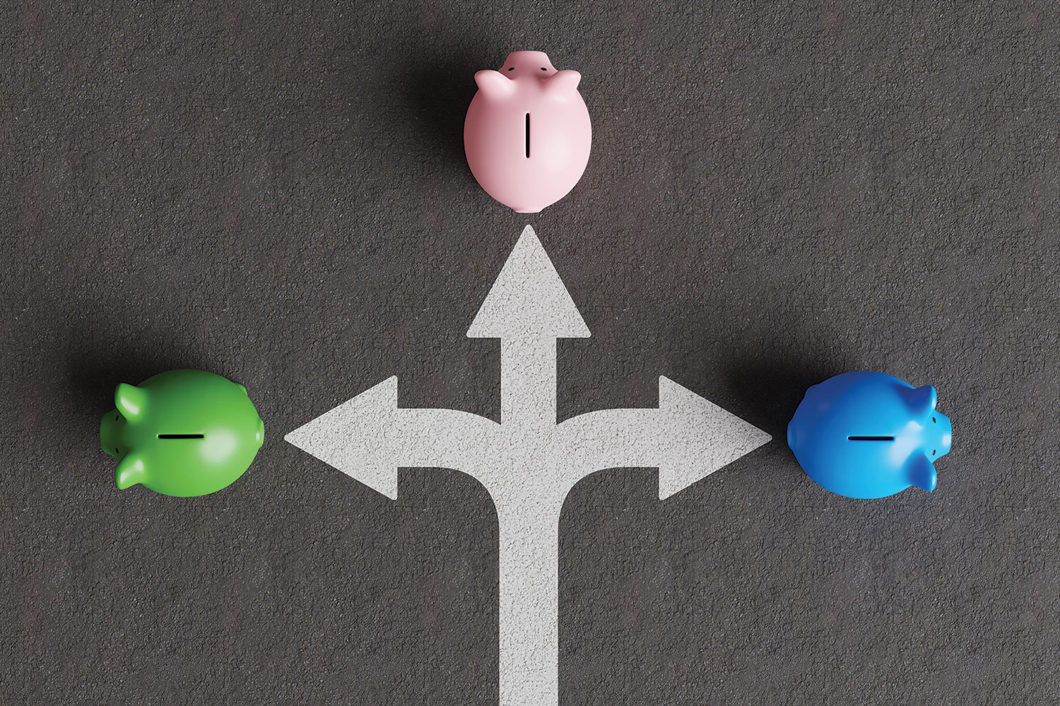 Photo from above of white arrow on grey background, branching off to left and right, with green, pink and blue, piggy banks at the respective arrow heads, from left to right.