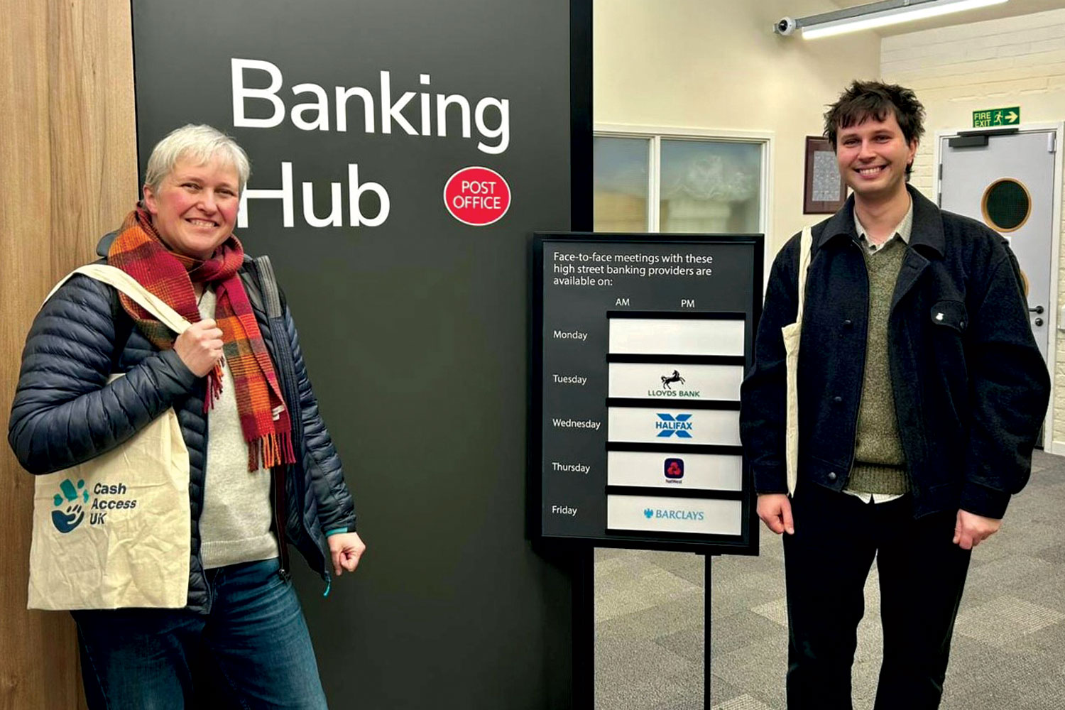 photo of Calderdale Council’s Cllr Diana Tremayne and Todmorden Town Council’s Cllr Tyler Hanley at Todmorden’s temporary banking hub